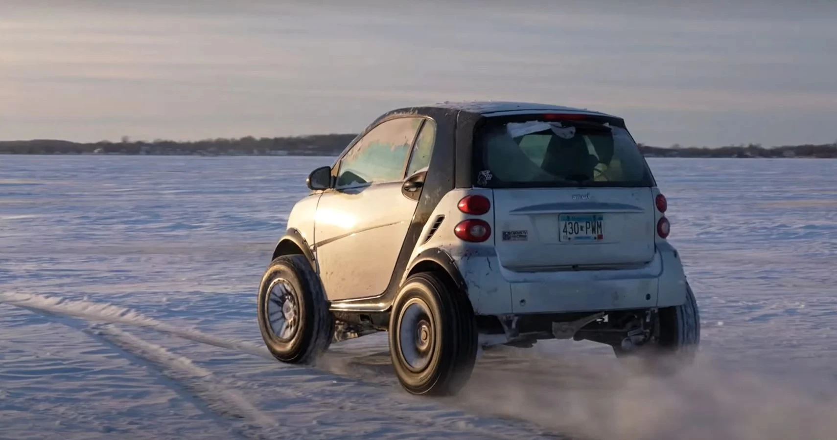 Watch A Lifted Smart Having Fun On A Frozen Lake